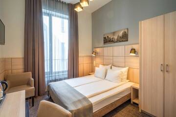 Небольшой двухместный номер с 1 кроватью или 2 отдельными кроватями в Отеле Wellton Centrum Hotel & SPA